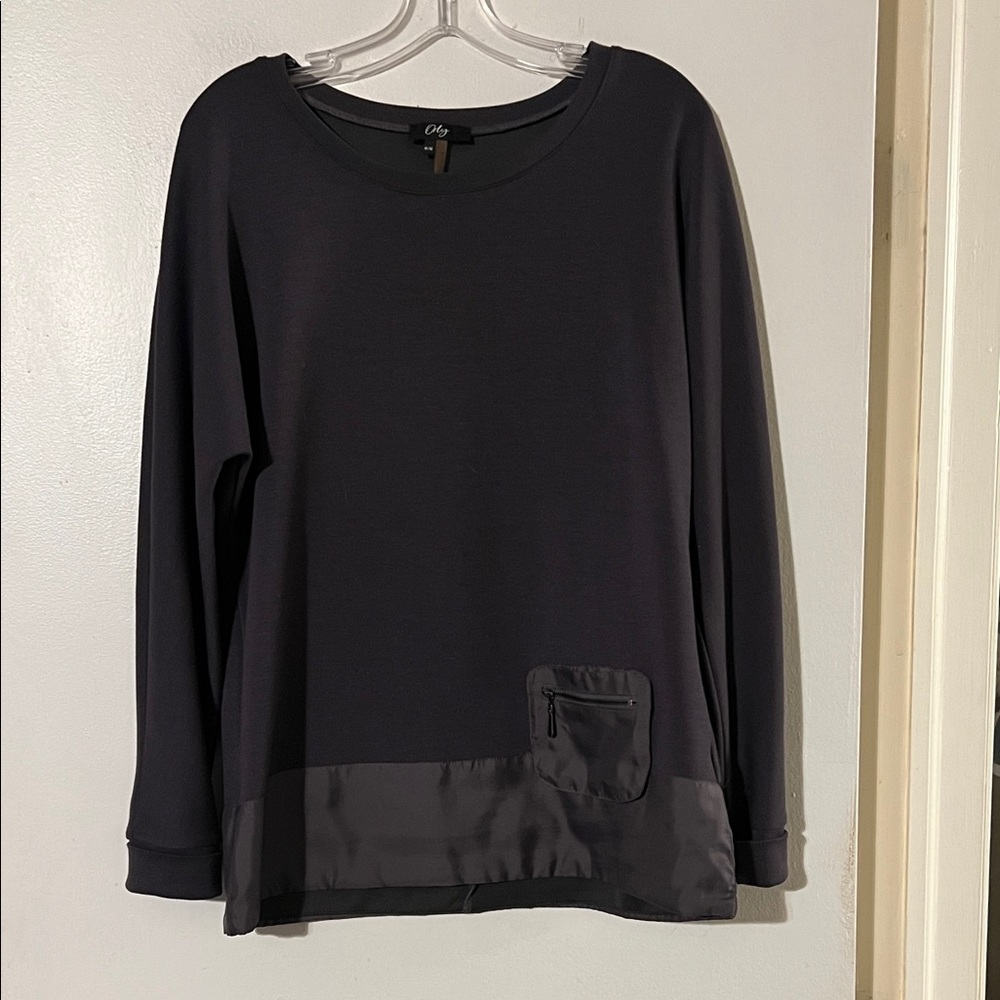 Orly purple round neck top with satin hem detail and patch zip pocket
